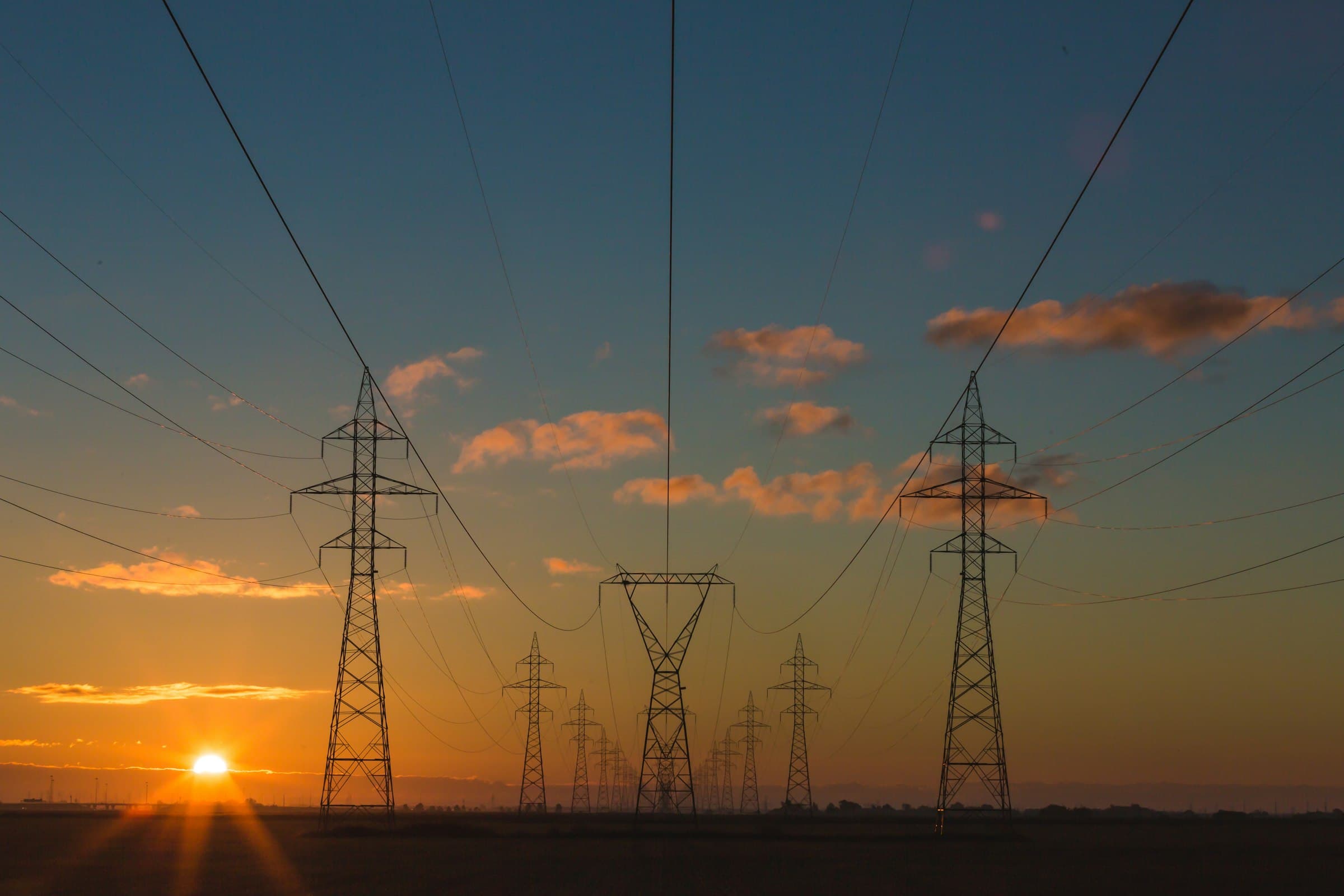 High-voltage transmission lines against an open sky